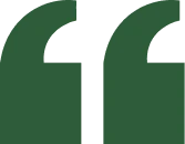Green quotation marks on a black background.